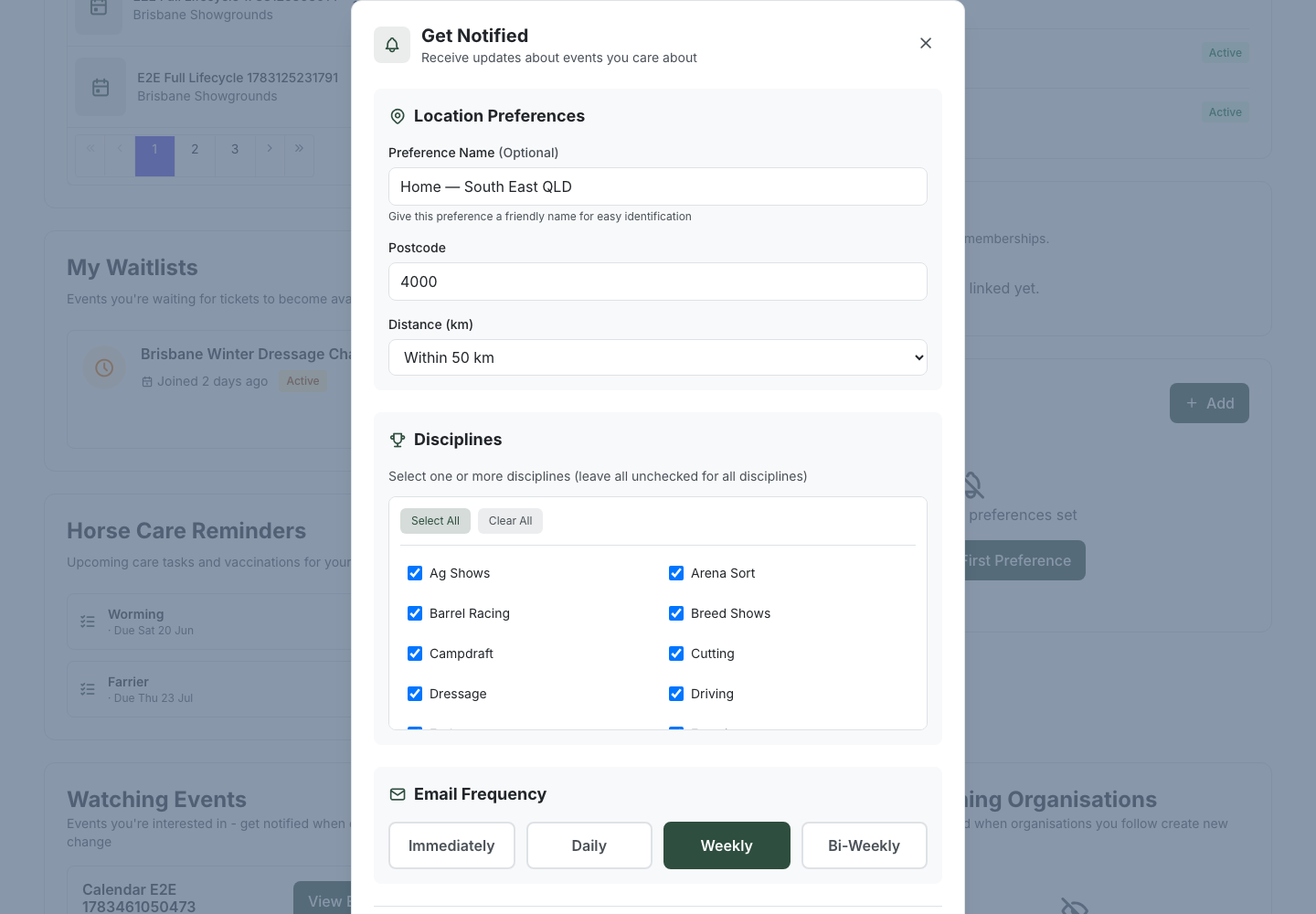 The "Get Notified" dialog headed "Receive updates about events you care about", with a Location Preferences section (an optional Preference Name field, a Postcode field, and a "Distance (km)" dropdown set to "Within 50 km"), a Disciplines section with Select All / Clear All and a checklist of disciplines, and an Email Frequency section with Immediately, Daily, Weekly and Bi-Weekly options