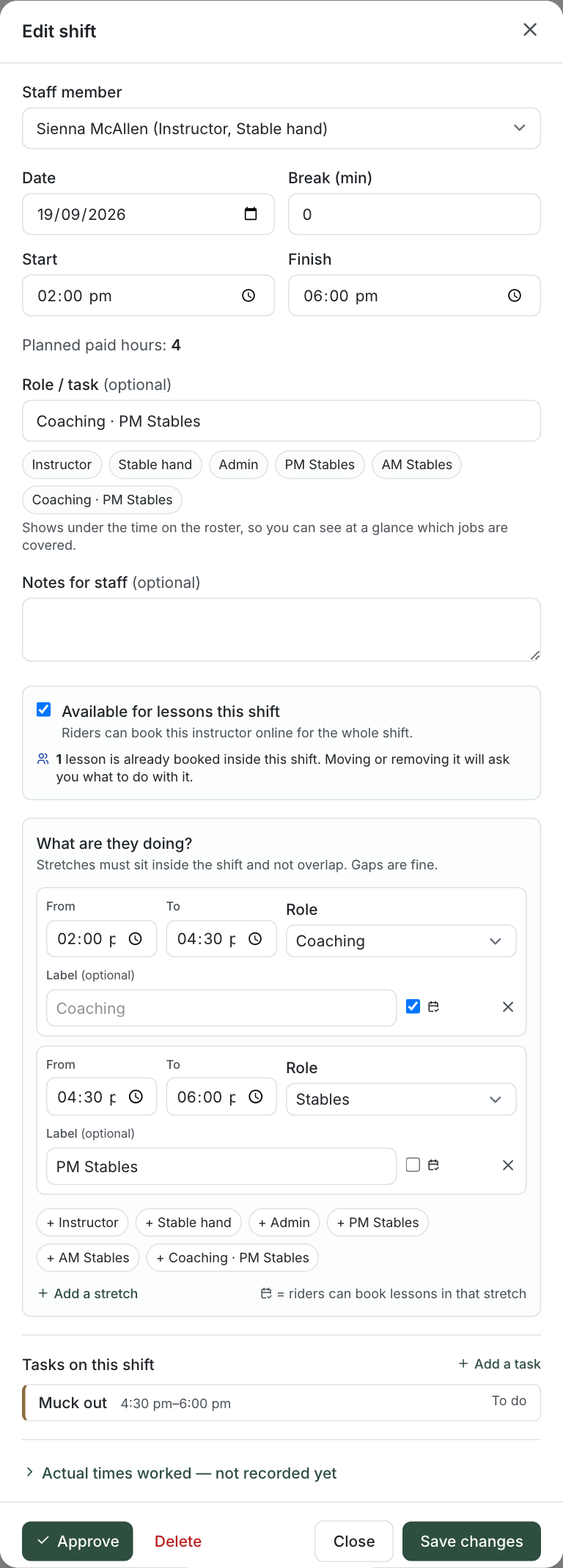 The shift editor: a Saturday afternoon split into a coaching stretch that takes bookings and a PM Stables stretch that does not, with a task already on it